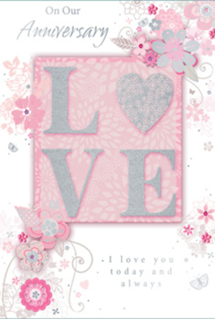 This anniversary card unfolds like a soft confession of love, the kind you might tuck beside a bouquet delivered to a riverside flat in Canary Wharf. The central motif, the word LOVE, is rendered in an elegant, frosted glitter finish that rises gently from the surface of the card. Each letter feels richly tactile, inviting touch the way the textured petals of a fresh rose invite a lingering hand. Around this centrepiece, hand-drawn blooms and feather-light sprays drift across the card's borders in shades of blush pink, lilac, and creamy ivory, their colours reminiscent of pastel bouquets carried home from a local florist after a walk along the docks. Tiny leaves curl between the blossoms, and fine filigree lines weave gracefully through the design, suggesting the gentle movement of stems as a florist arranges them on a workbench near Cabot Square or West India Quay. Almost-hidden butterflies are tucked among the petals, so subtle they feel like shy symbols of fluttering hearts and new promises. The background holds everything in a soft, warm light, a muted blush tone that adds a feeling of serenity, like the sky just before sunset reflected on the water by the wharf. The heartfelt message, including the phrase I love you today and always, sits in understated, flowing type beneath or alongside the floral motif, allowing the design to breathe while still offering deep sentiment. The entire card feels like a paper bouquet: composed, romantic, and quietly fragrant in the imagination, perfect to accompany fresh anniversary flowers sent across Canary Wharf, Limehouse, or nearby Isle of Dogs to honour a love that is cherished every single day.